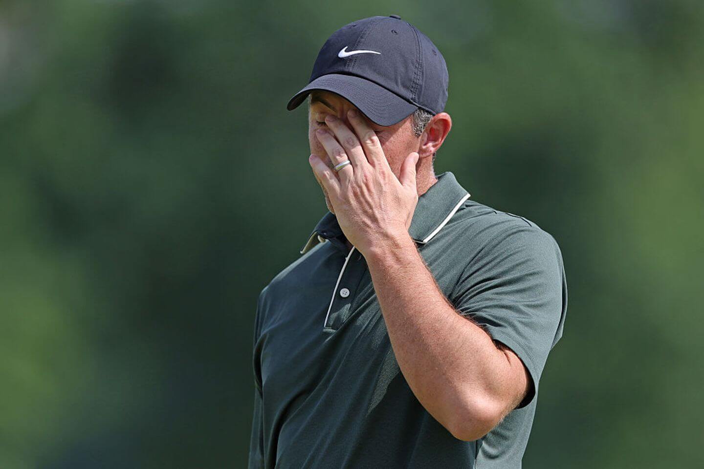 Golfers in action at Quail Hollow, tracking the PGA leaderboard